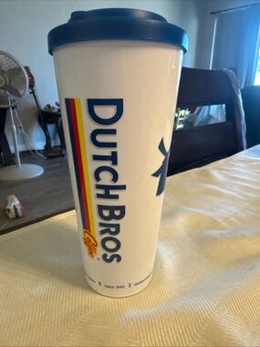 Dutch Bros White Tumbler with Blue Lid and Rainbow Stripe